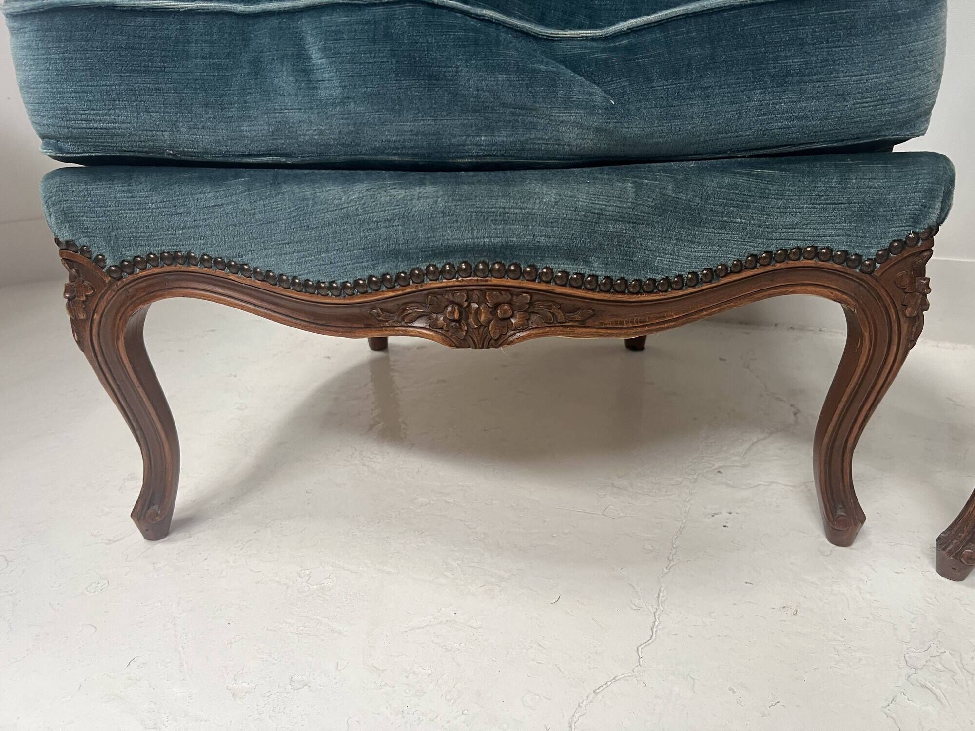 Pair of Louis XV style armchairs in natural wood, 20th century.
