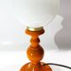 Vintage lamp in orange turned wood and opaline globe