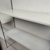 Metal string shelf