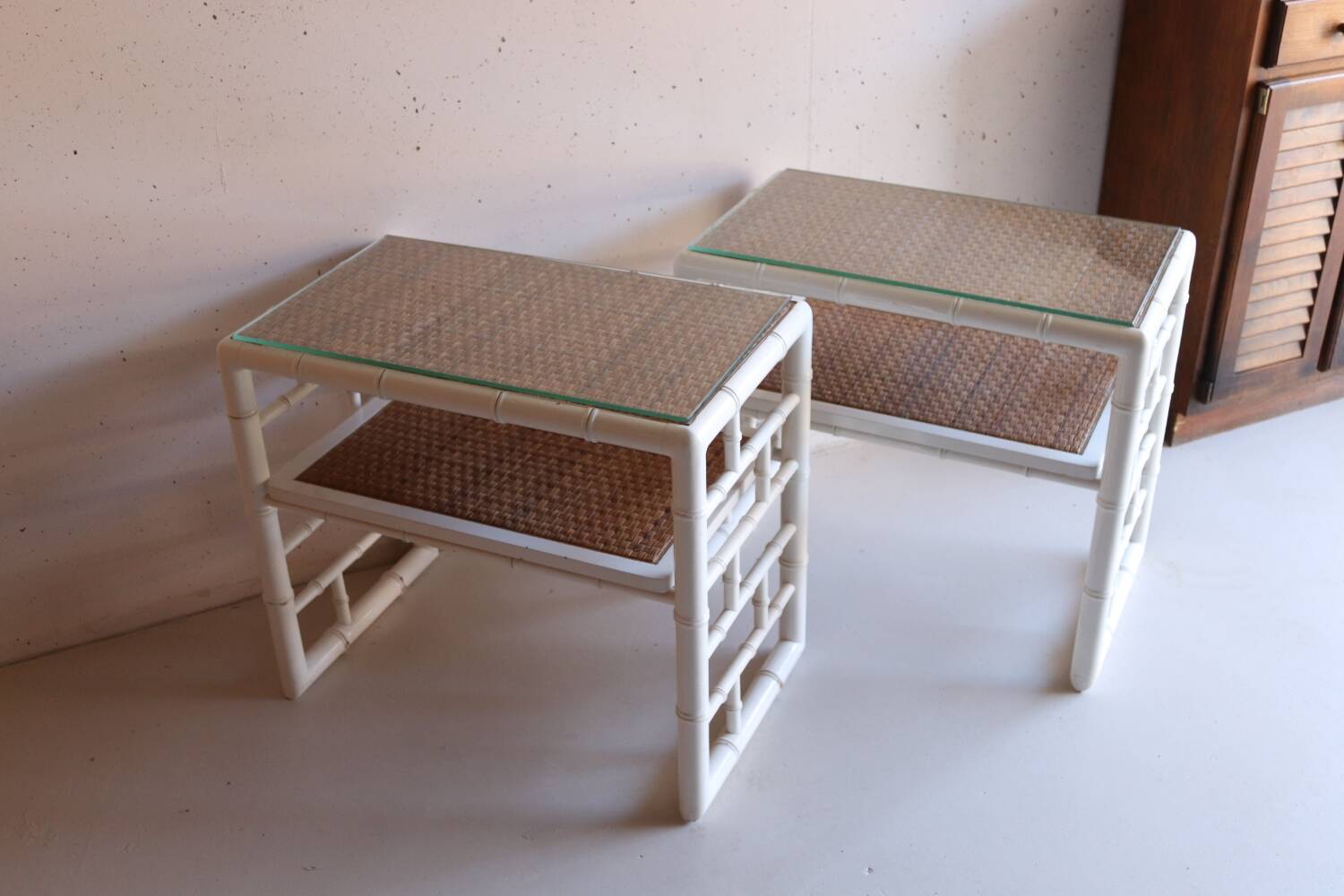 Pair of bedside tables in bamboo effect wood and woven wicker