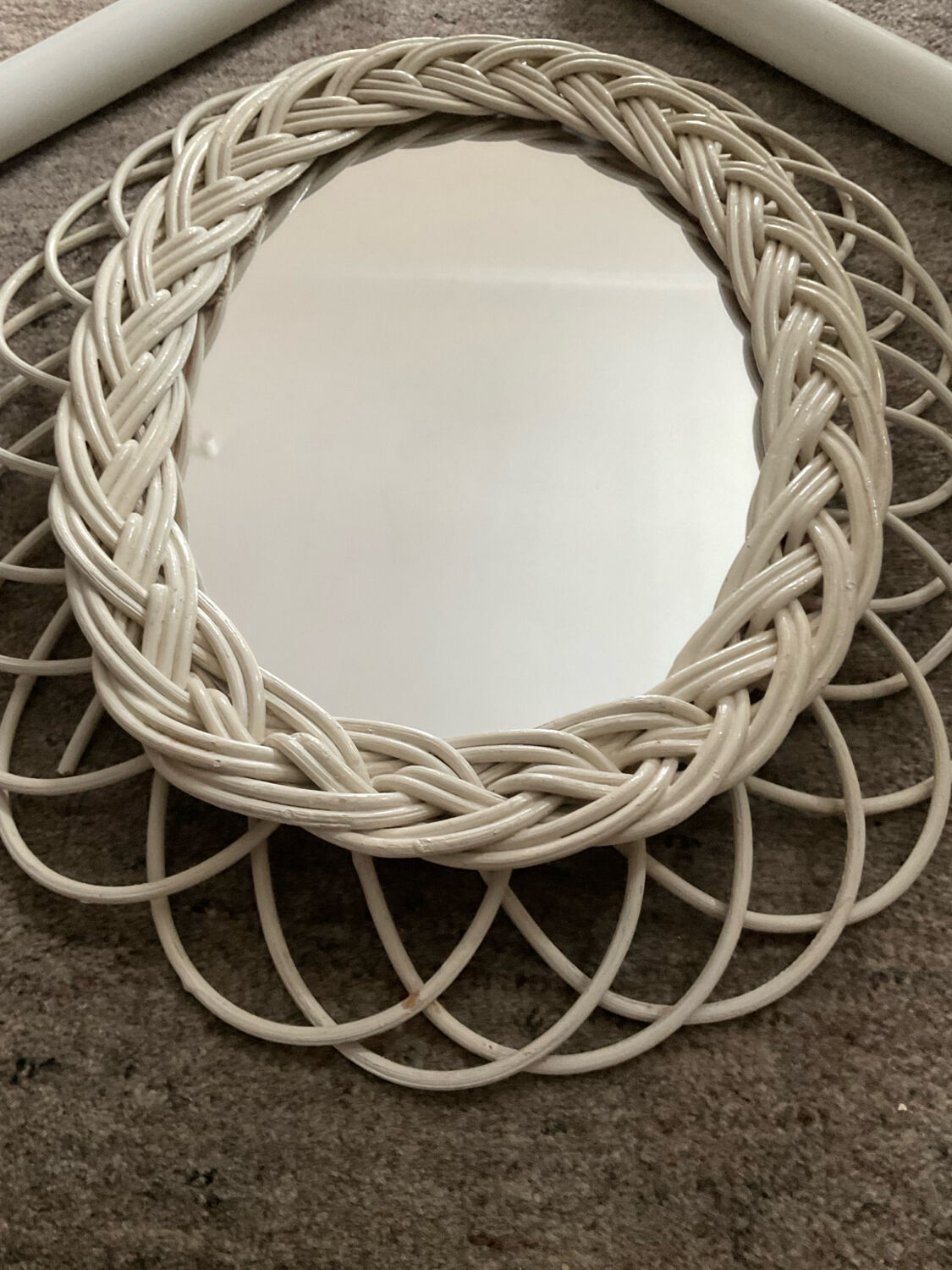 Rattan entrance set with mirror and 2 coat hooks.