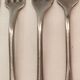 10 mismatched silver metal forks