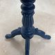 Wooden gueridon with a violin-shaped top in Rio rosewood, central base resting on four legs, reinterpreted in Baltic blue.