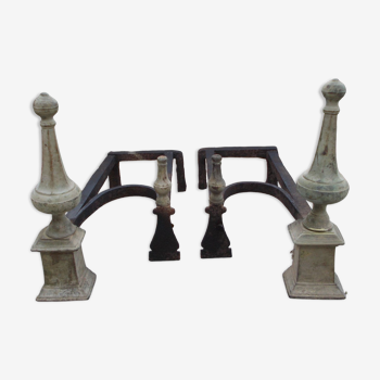 Old pair of wrought iron and bronze pegs