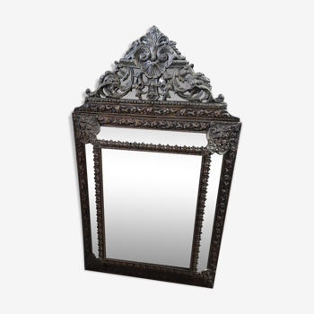 Mirror with embossed brass bead