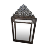 Mirror with embossed brass bead