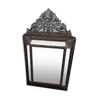 Mirror with embossed brass bead