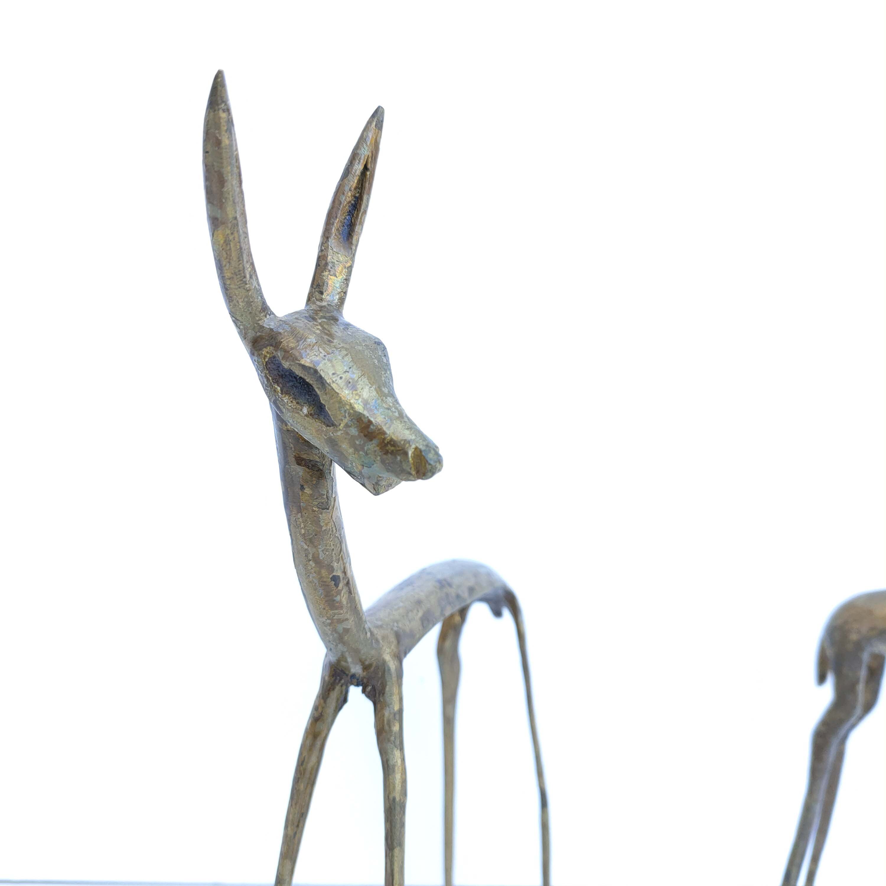 Brass gazelle couple
