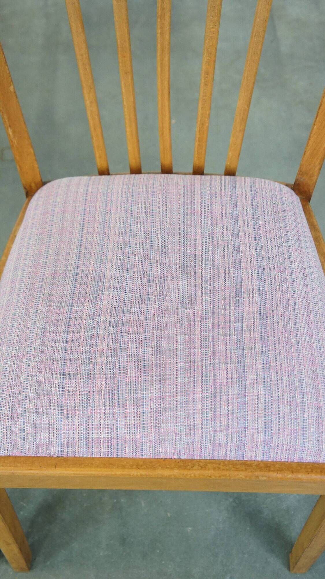 Set of four dining chairs from the 1970s with fabric seat and wooden frame