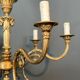 Bronze chandelier with ram's head motifs in the Louis XVI style, in the manner of Maison Jansen.