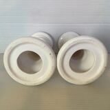 Pair of white earthenware candle holders