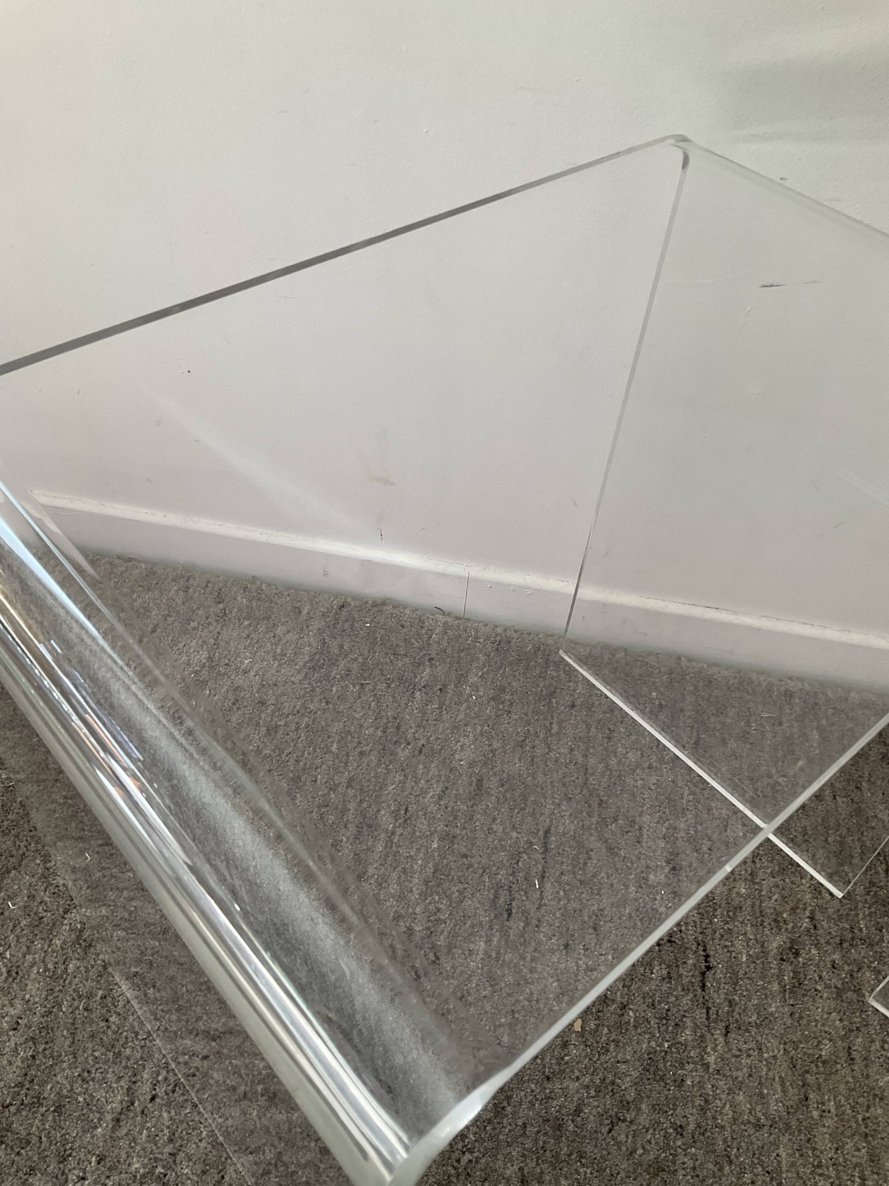 Duo of pull-out tables in plexiglass 70s