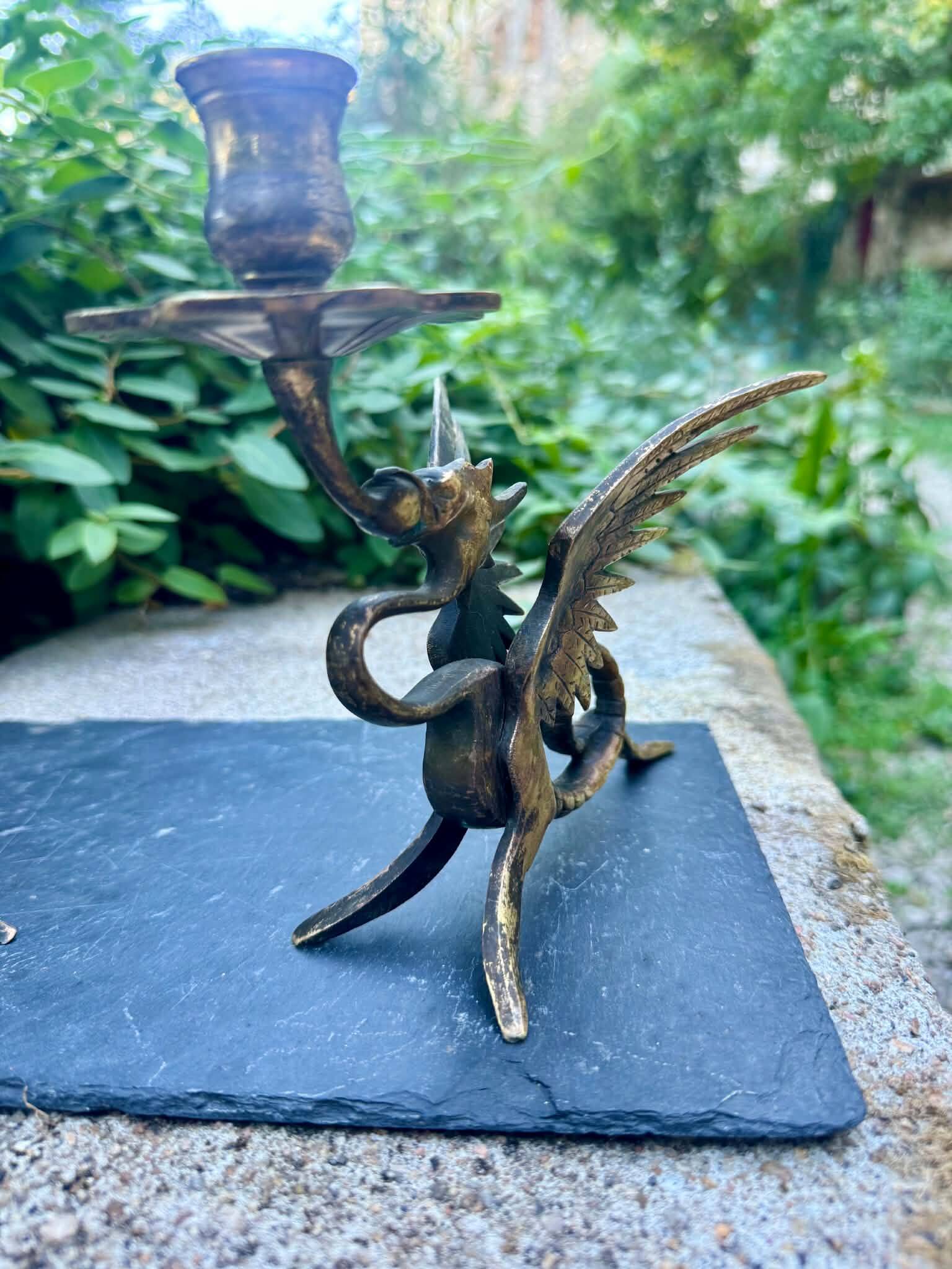Pair of chimera candle holders in bronze, 19th century.