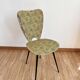 Faux leather chair assigned to Hitier.