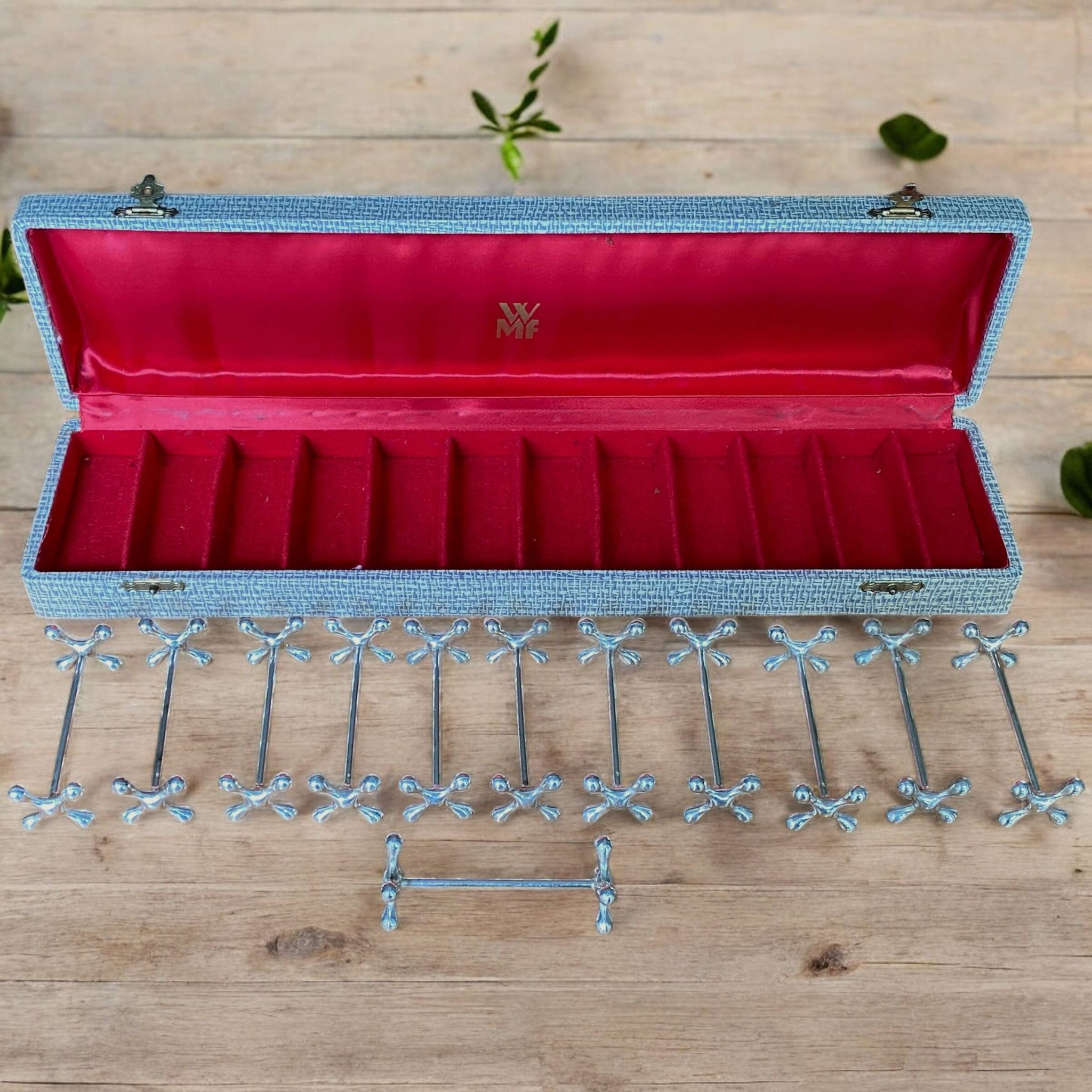 12 WMF silver-plated knife holders, boules model, in a box