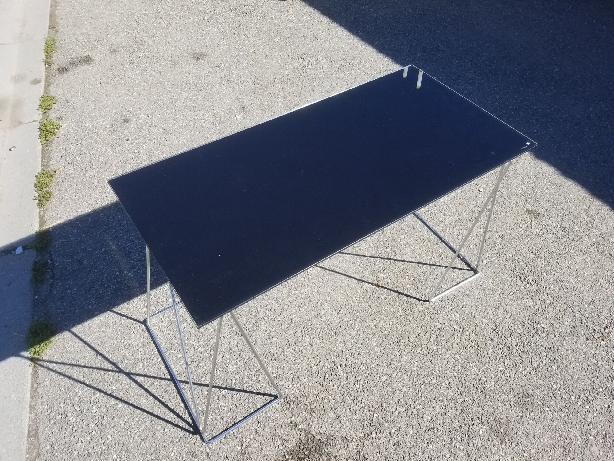 Vintage steel wire desk with chrome trestles and smoked glass top
