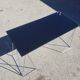 Vintage steel wire desk with chrome trestles and smoked glass top