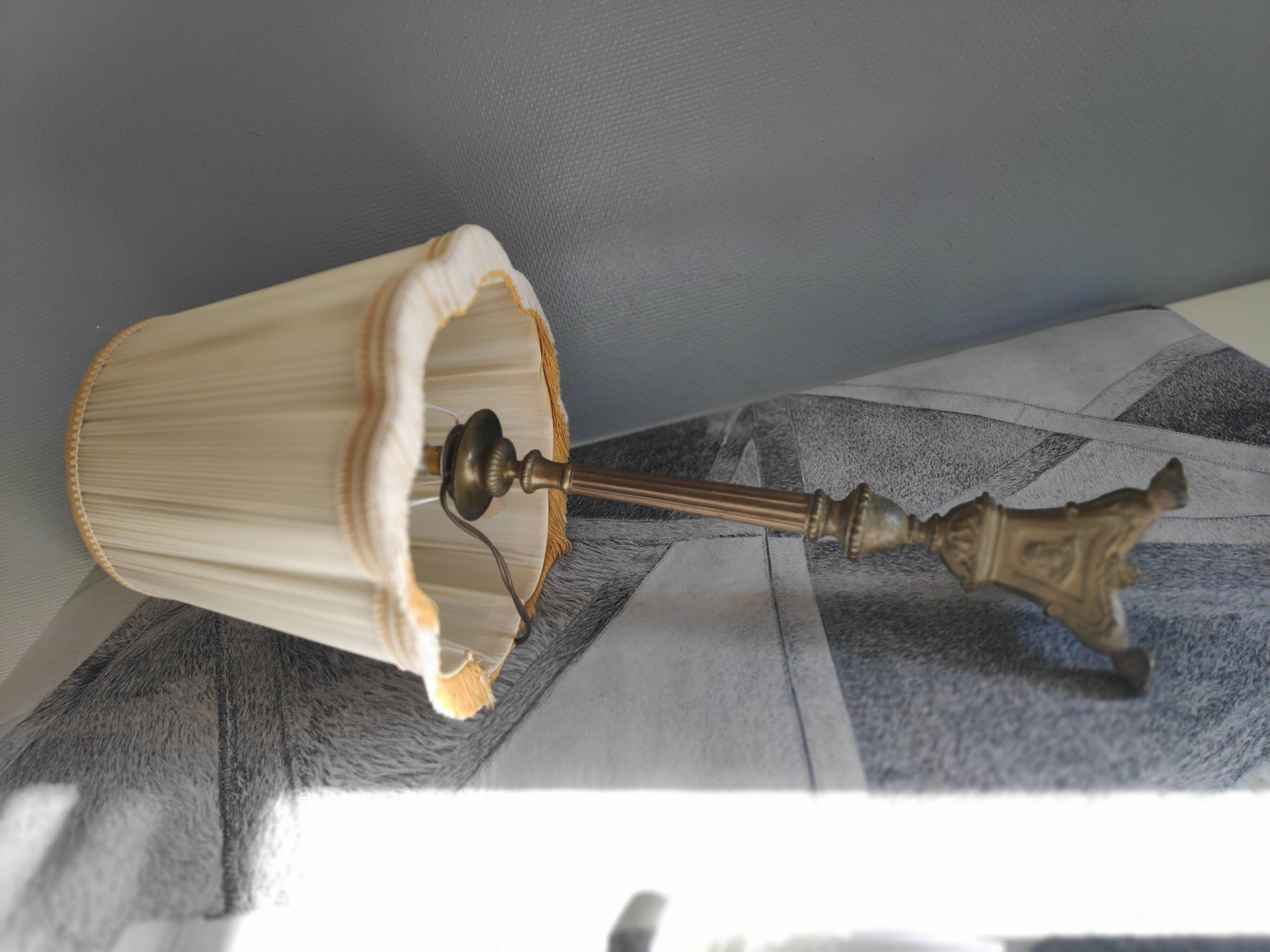 Old brass foot lamp and period lampshade