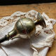 Oriental sprinkler in silver metal and brass
