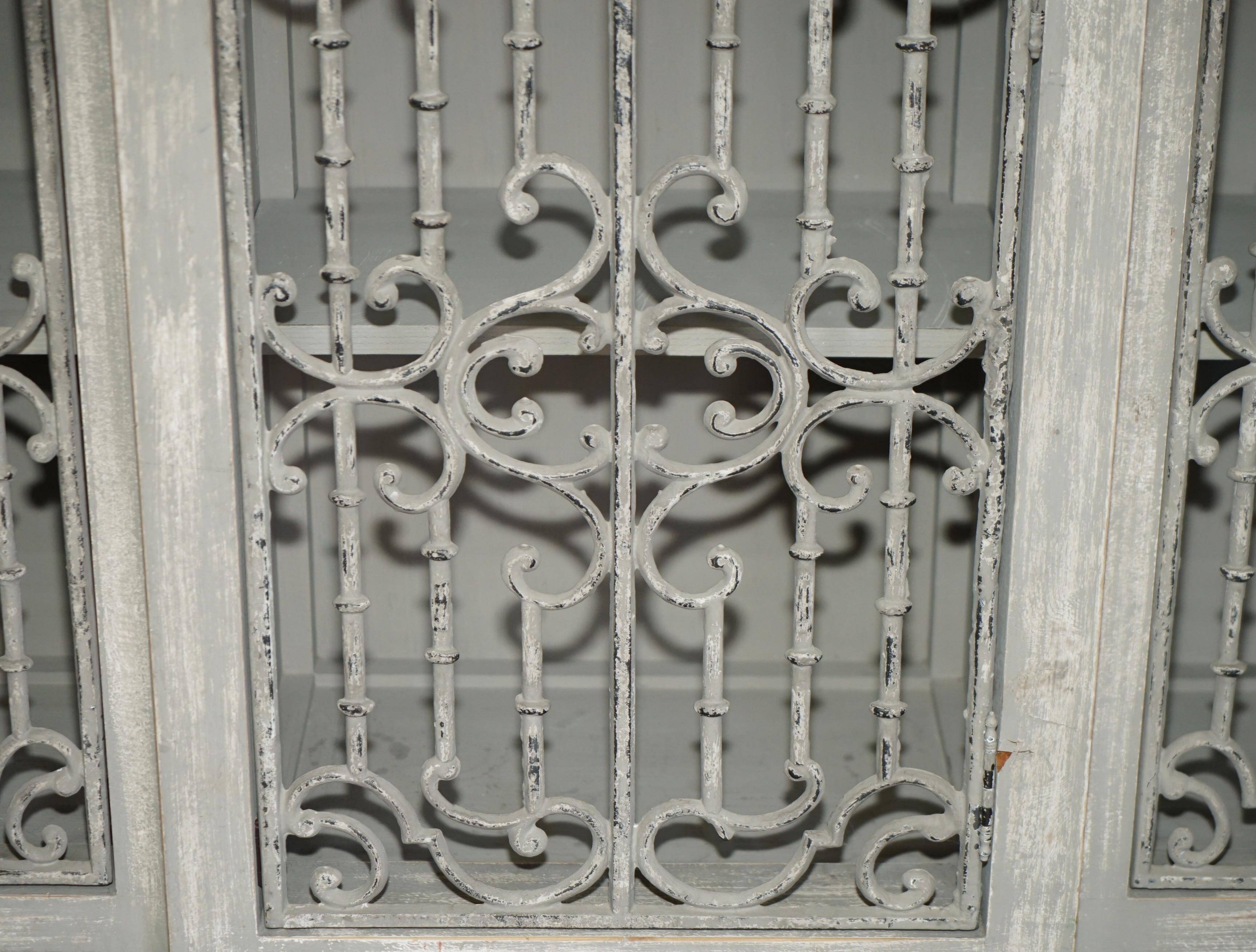Vintage sideboard with wrought iron doors