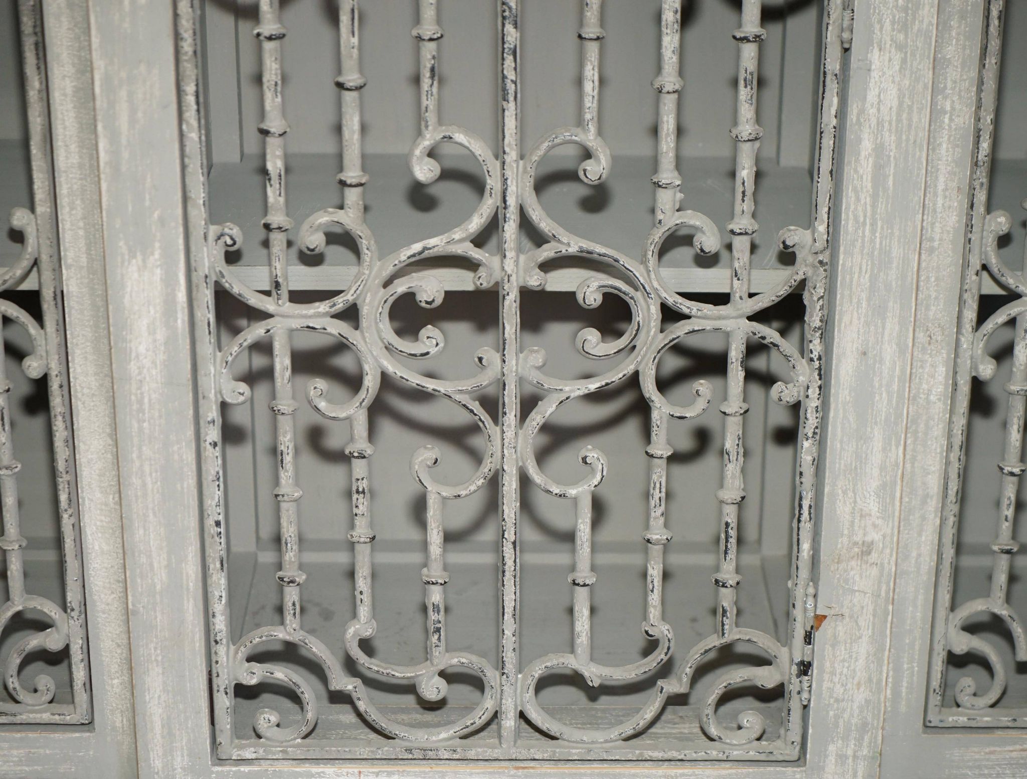 Vintage sideboard with wrought iron doors