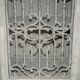 Vintage sideboard with wrought iron doors