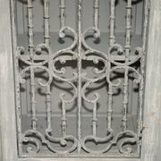 Vintage sideboard with wrought iron doors