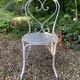 White lacquered wrought iron garden furniture set