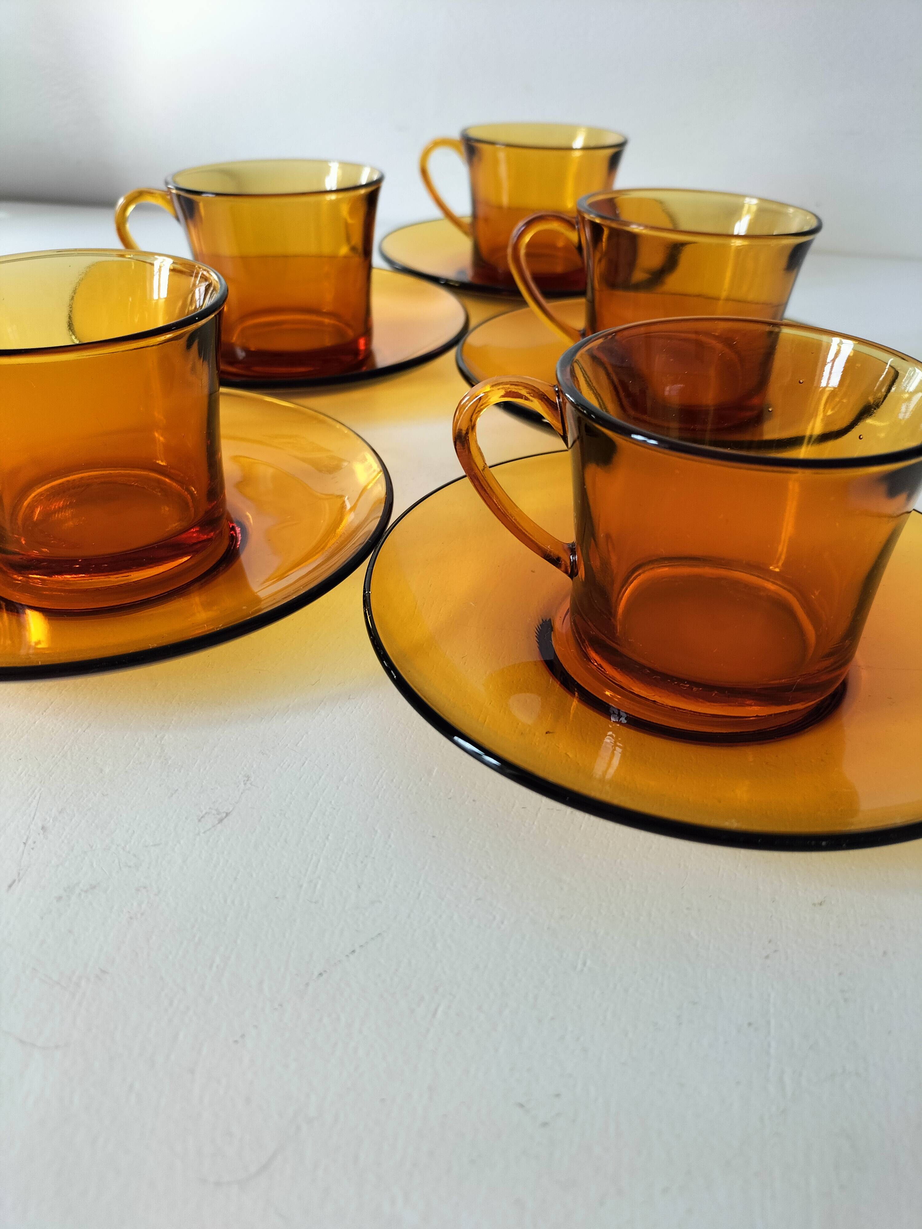 5 vintage amber Duralex cups and saucers