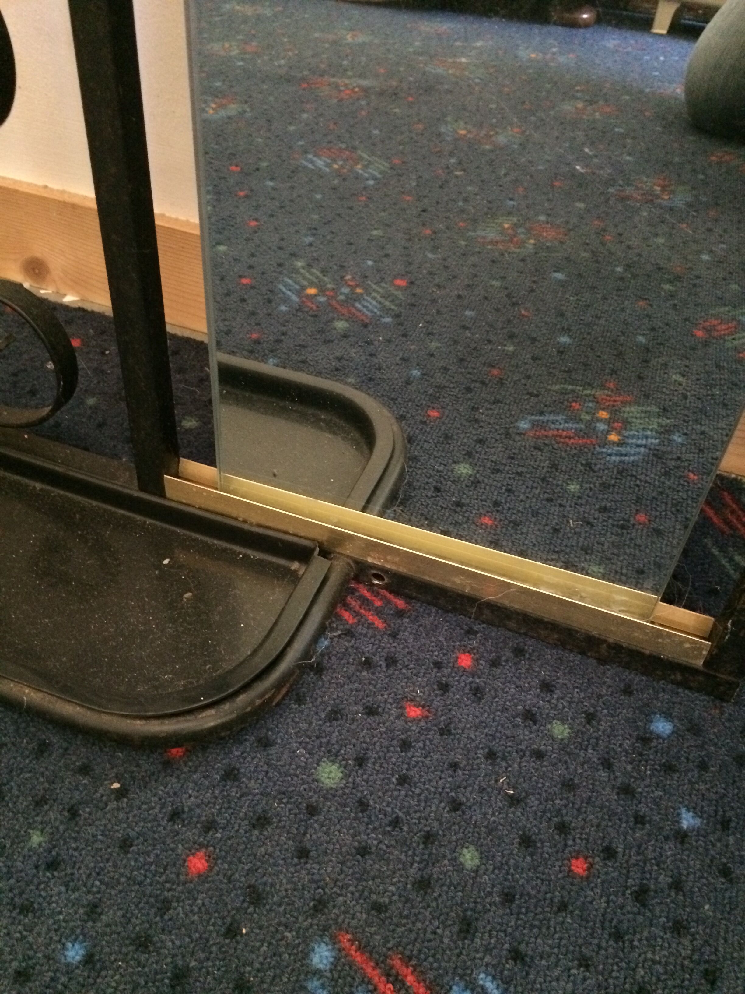 Coat hanger on wrought iron feet