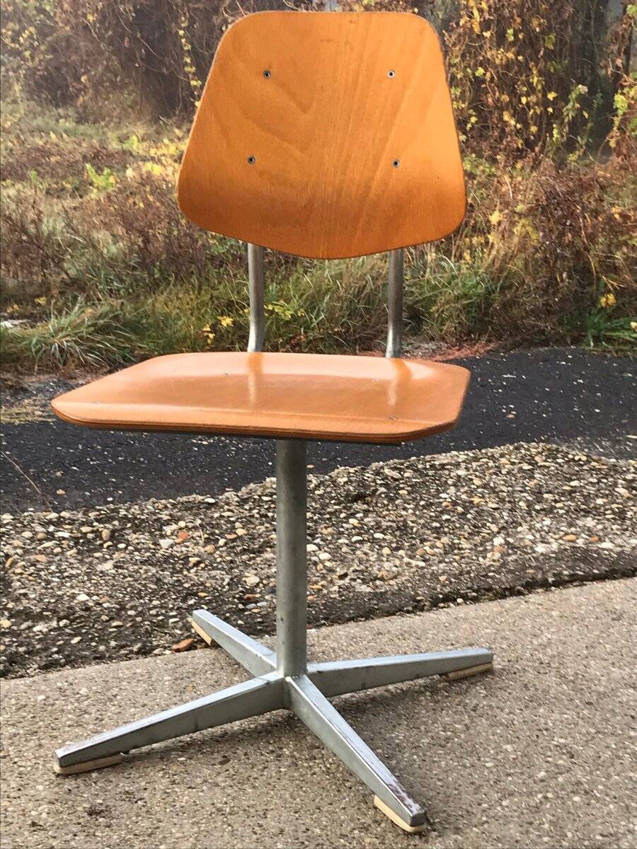 Set of 3 Embru school chairs, Switzerland, 1960s — brown plywood and steel frame.