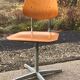 Set of 3 Embru school chairs, Switzerland, 1960s — brown plywood and steel frame.