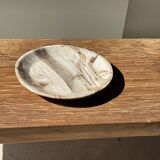 Tray, circular dish or plate made of white striped grey petrified wood.