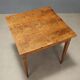 Antique neoclassical walnut coffee table with maple inlays, 18th century.