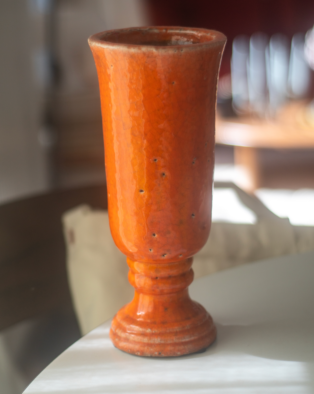 Orange glazed terracotta vase