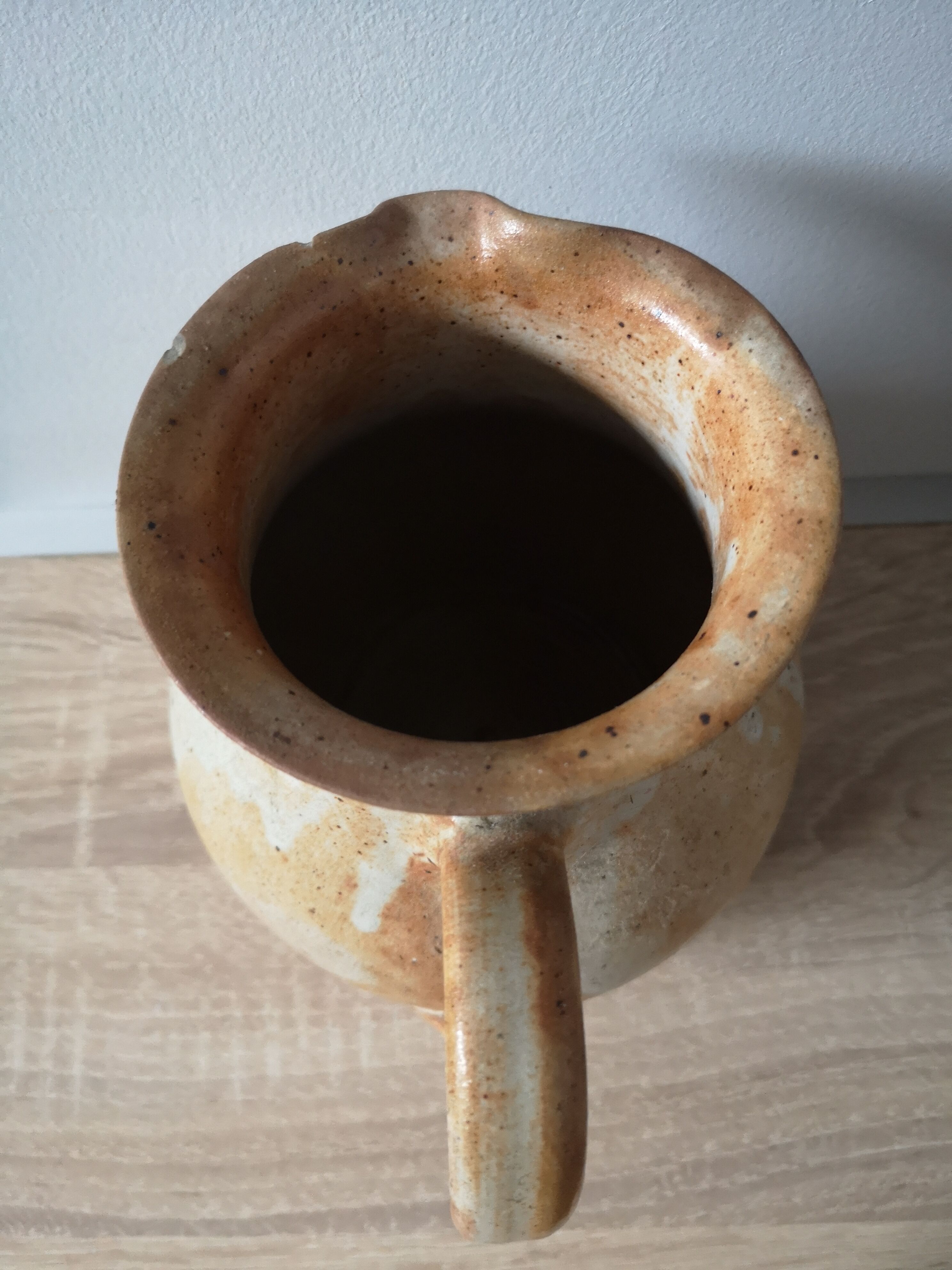 Lot of 4 pitchers in sandstone