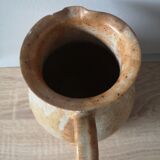 Lot of 4 pitchers in sandstone