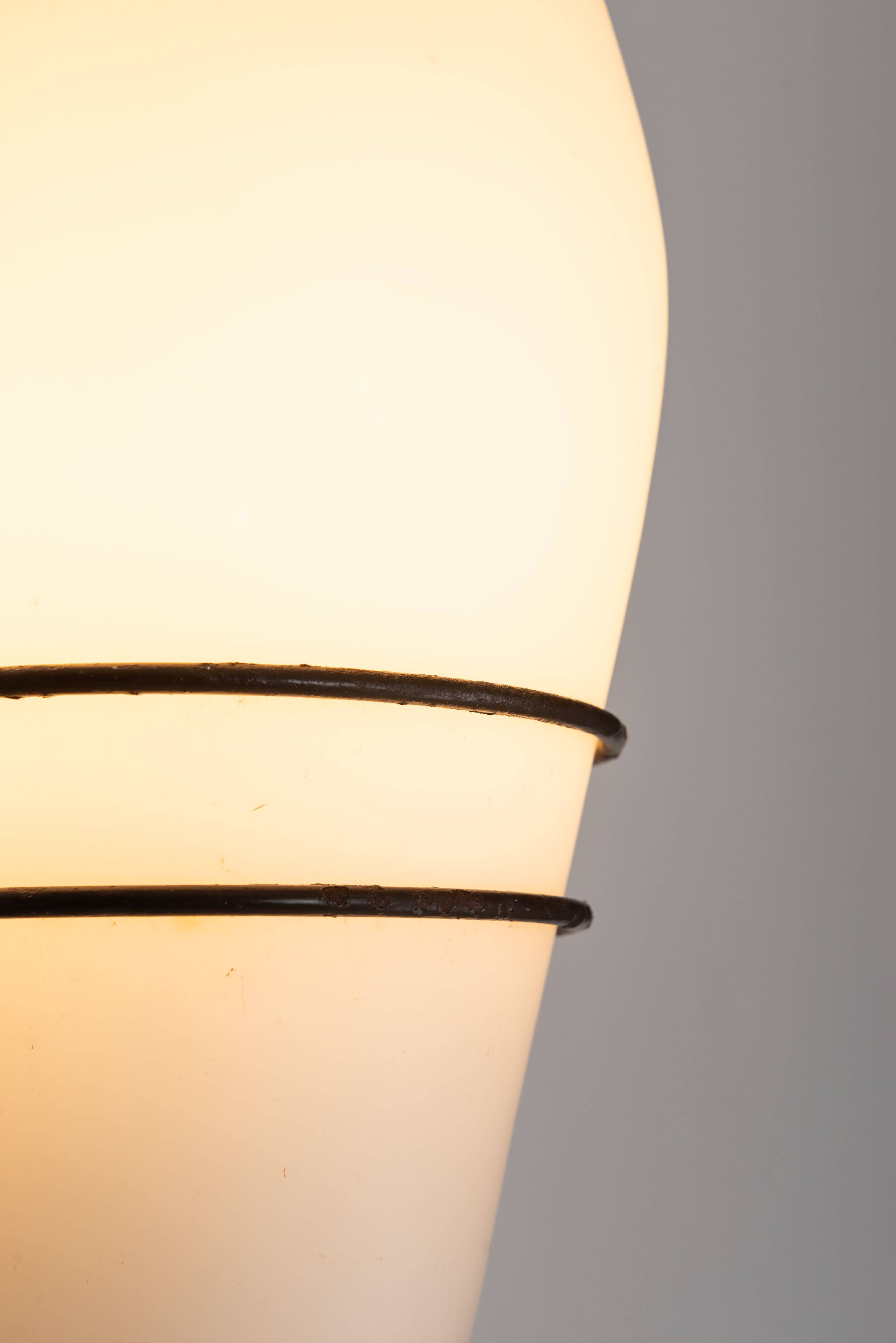 Large outdoor lamp made from metal and opal glass