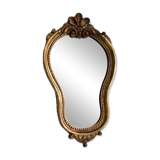 Small golden mirror in baroque style