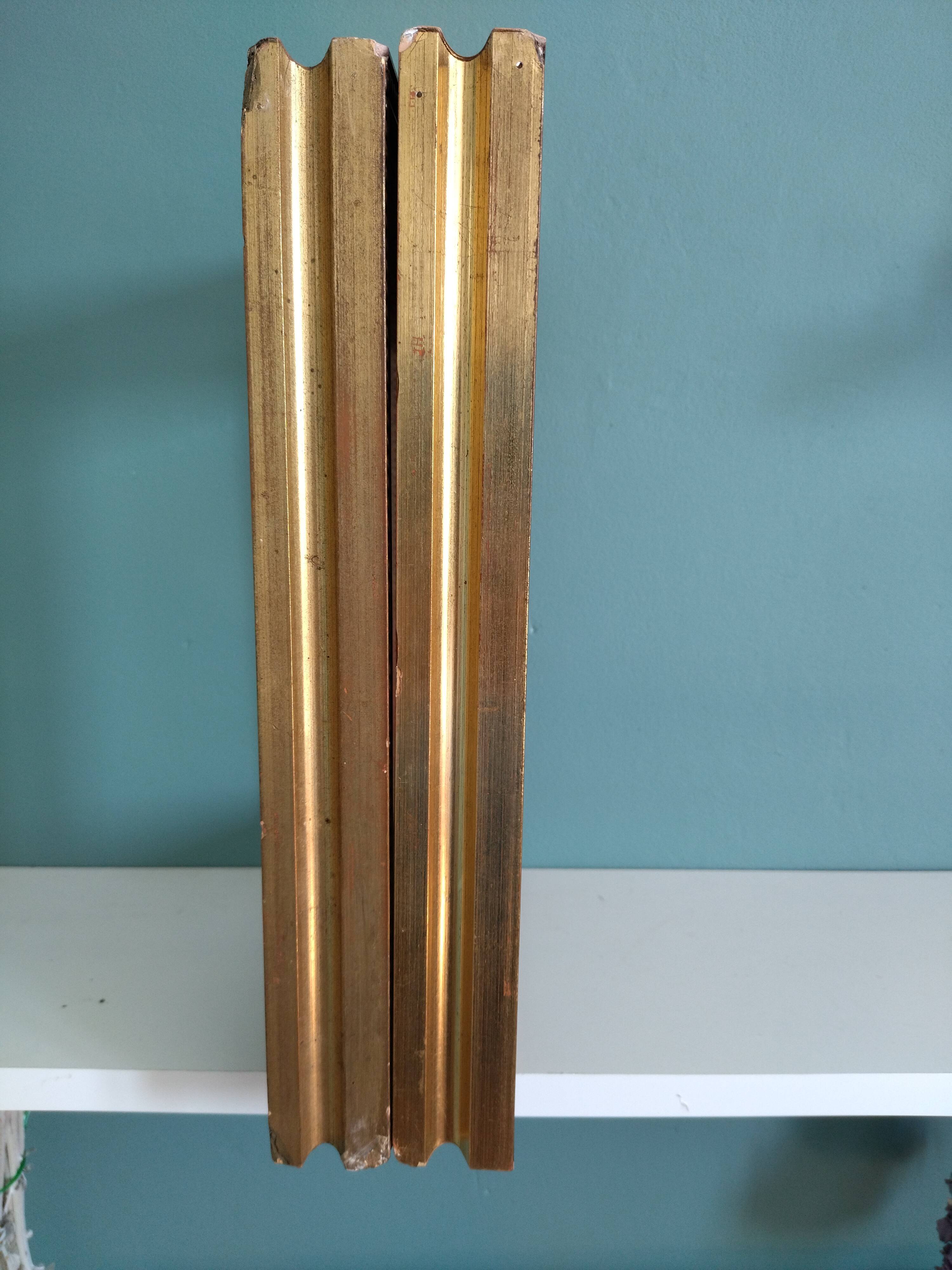 Pair of frames in old carved wood