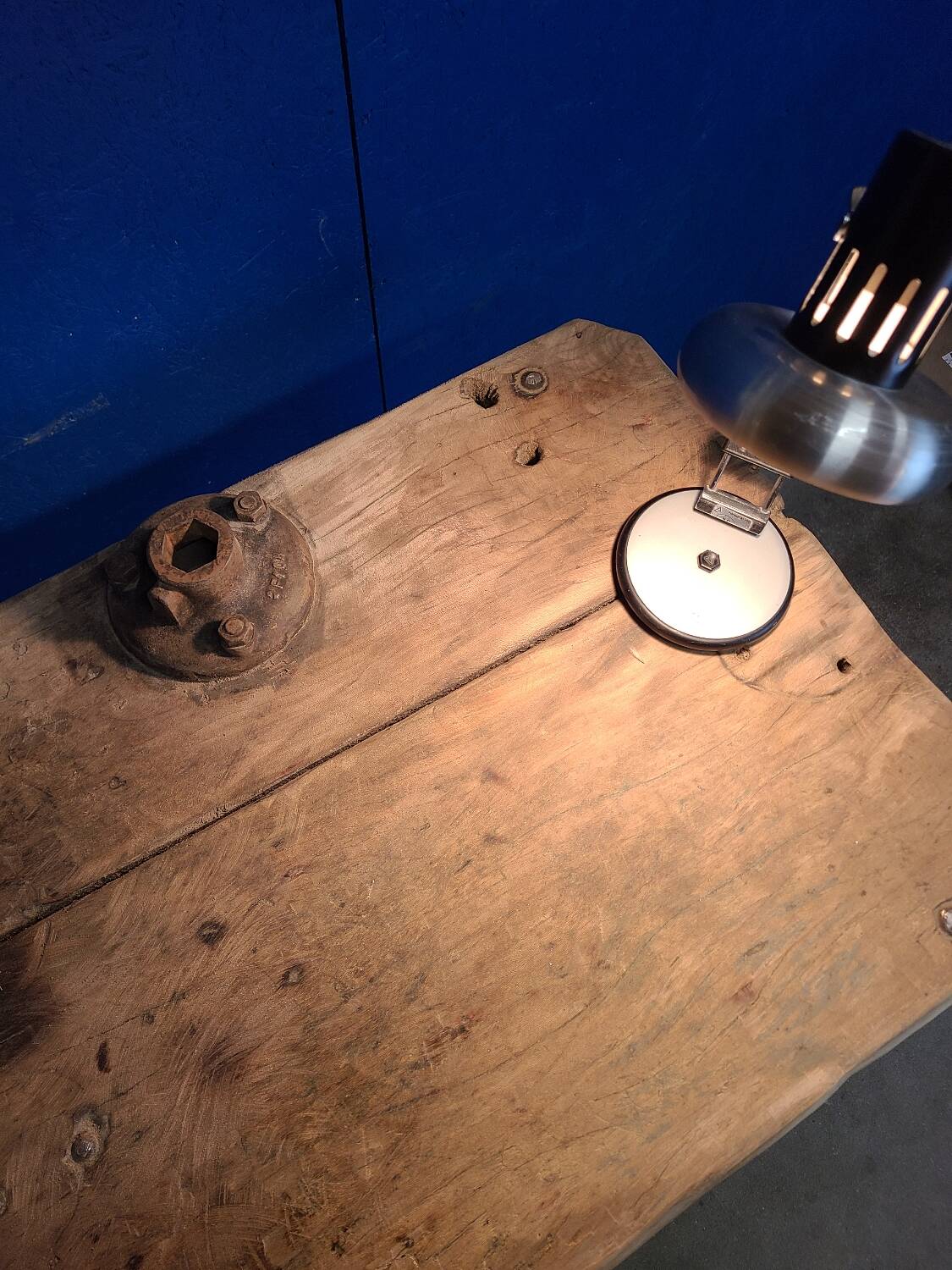 Vintage workbench circa 1930, folding metal leg.