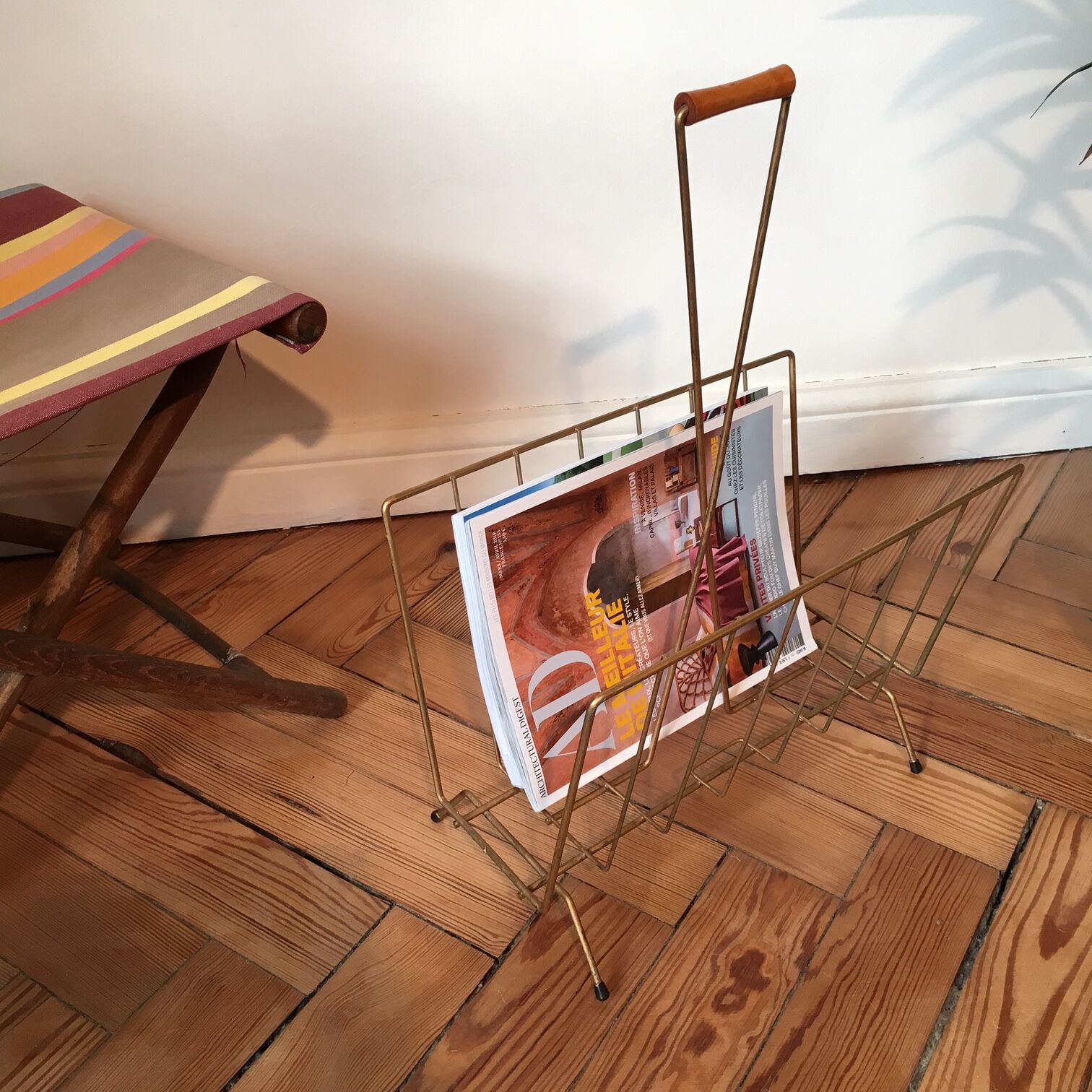 Vintage gold metal magazine rack and wooden handle