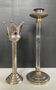 A pair of Art Deco candle holders in silver-plated metal and brass.