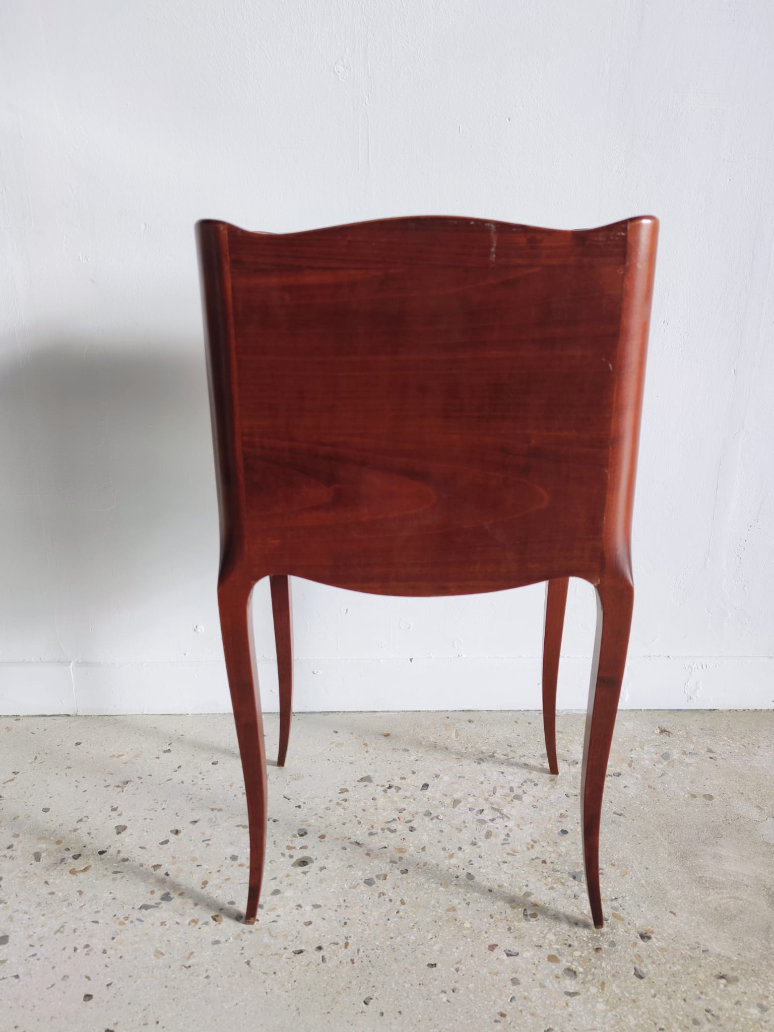 Three-drawer cherry bedside table