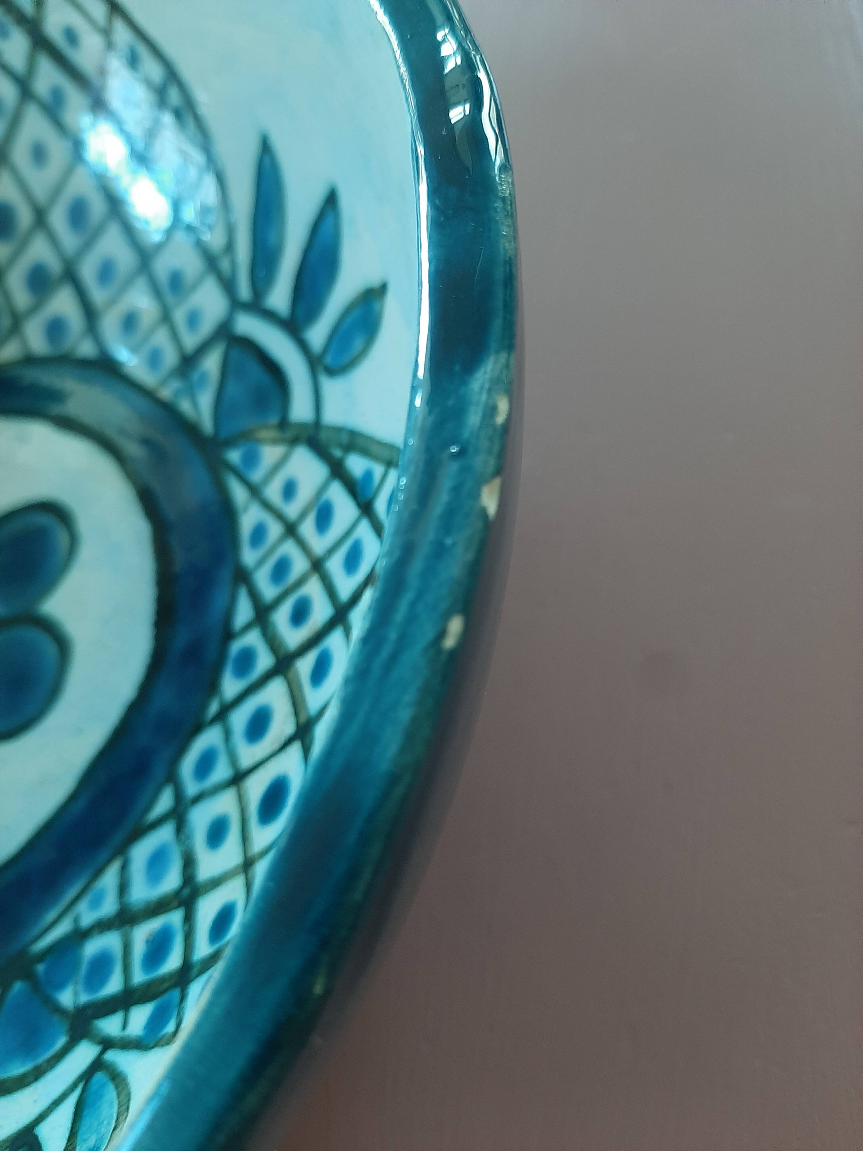 barbotine style salad bowl with blue floral pattern
