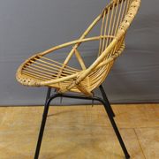 Living room in rattan and black lacquered iron by Rohe Noordwole circa 1950
