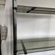 Chromed metal tubular shelf with smoked glass.