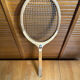Vintage wooden tennis racket challenge sport