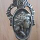 Old bronze fireplace servant decor medallion shovel clamp brooms