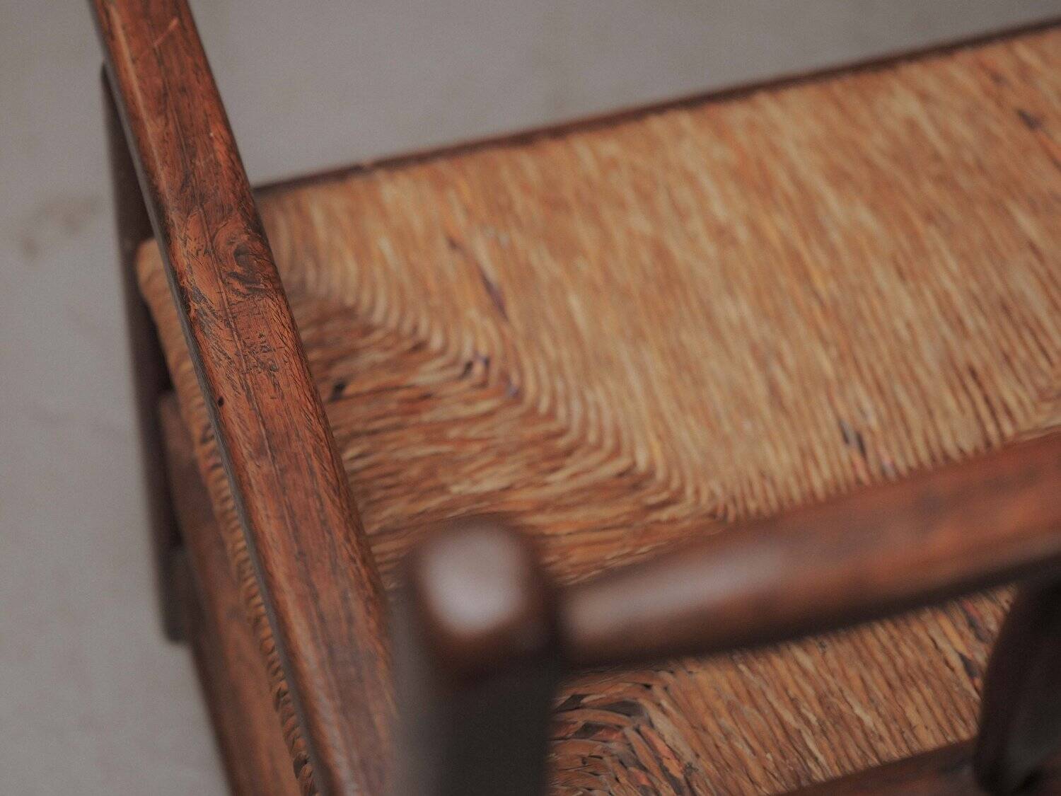 Wicker armchair in solid wood, handcrafted, France, around 1950.